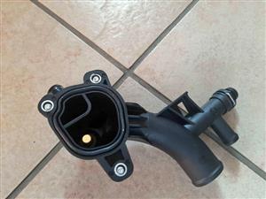 RENAULT THERMOSTAT HOUSING. BRAND NEW. FOR VARIOUS OTHER CARS TOO.