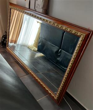 Beautiful wall mirror wooden frame the size 179 x 170cm we are moving has to sel