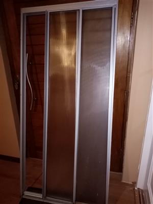Aluminium tri-slider shower door, taps, shower head