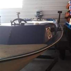 boat with motor and trailer 