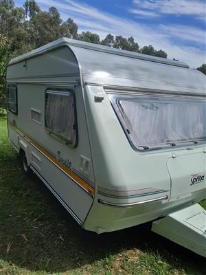 1993 sprite swift in amazing condition with larger fridge and L shape tent