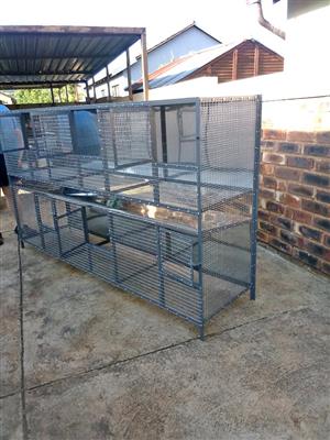 Pet cages 2.4 m long divided in 3 sections.