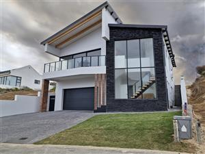 A Modern Masterpiece Steps from the Ocean