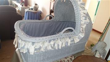 Baby cane crib with mattress, pillow, linen and steel stand.