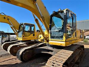 EXCAVATOR AND POWERSTAR TRUCK