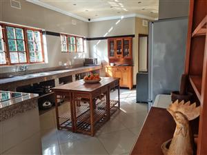 COASTAL HOME NESTLED IN LARGE NATURAL GARDEN