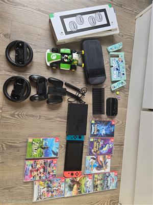 Nintendo Switch + 8 Games + Full Accessories Bundle – Excellent Condition