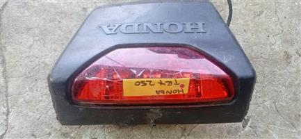 Honda TRX 250 taillight. Meyerton bike scrapyard new and secondhand spares and accessories.