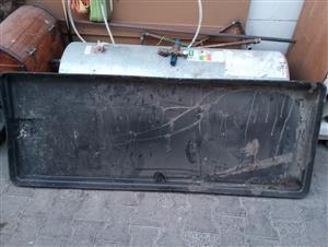 Second hand geyser with fittings and drip tray