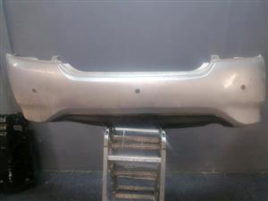 Nissan Almera silver rear bumper DM or contact number in the description for assistance.