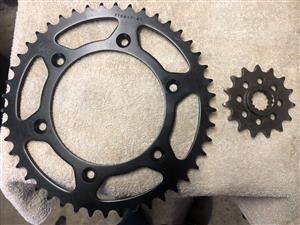 Motorcycle sprockets, 1 x 45 tooth rear and 1 x 15 tooth front sprockets
