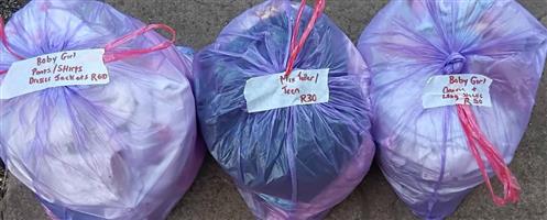 Clothes sizes baby, teenager,  woman and men. Selling bundles.