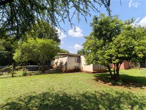 Main House • 2 Bedrooms, 1 bathroom • Lounge, patio, kitchen with cupboards • Study/laundry, 2 air-conditioners