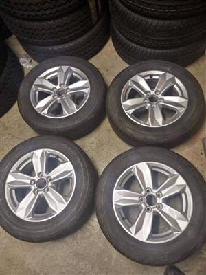 15inch Audi A1/Polo(5x100pcd OEM mags with 185/65/15 Bridgestone tyres 