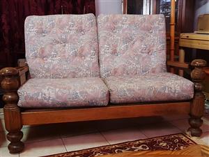 Two oak-framed two-seater settee and two oak-framed one-seater.