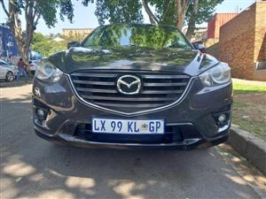 2015 Mazda CX-5 Skyactive  117000kms, Automatic  Reverse camera  Petrol Grey Color.