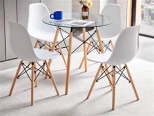 Glass topped dining table & 4 chairs