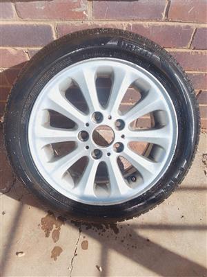 BMW 16 inch Prelli mag and tire