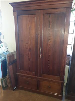 Free-standing, Oregon pine wardrobe with lower drawers