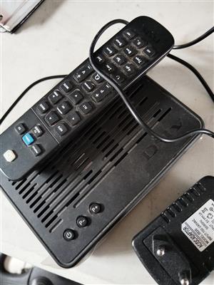 Dstv Hd decoder with remote and power cable