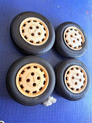 13 INCH NISSAN DESIGN RIM SET+ TYRES & WHEEL CAPS PRE- OWNED