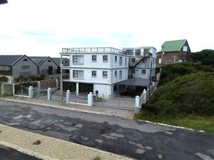 Spacious 12-Bedroom Beachside Home with Stunning Sea Views