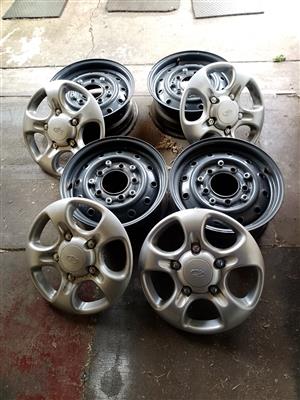 Mahindra Rims. Set of 4 new rims, with new Caps and bolts. Must buy as a set. 