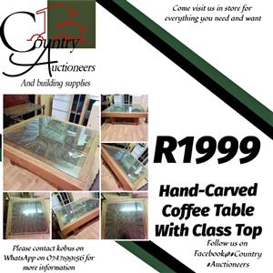 Hand-Carved coffee table with class top