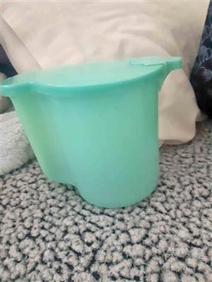 Vintage Tupperware milk pitcher from the Millionaire Line.