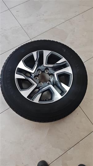 Toyota Fortuner OEM 18inch mag with 265/60/18 used tyre to use for spare wheel f