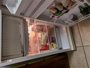 Frige with freezer on top many space