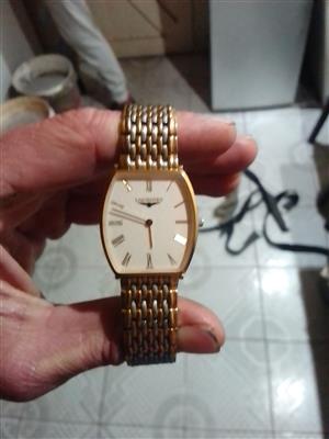 Gold longines watch 