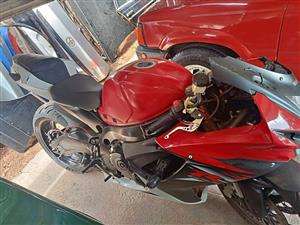 Suzuki 750 GSXR bike as is starts and drives, papers on hand. Needs fairing kit.