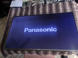 55 ' Panasonic smart TV with wall bracket. 