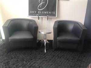 Tub Chairs in Nguni Hide and Genuine Black leather. Priced per chair.