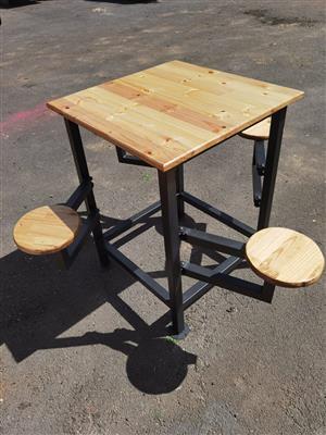 Table with movable chairs
