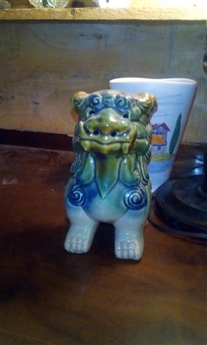 Hand glazed majolica style Foo Dog, believed to keep your luck in. View at Rendalton St Albans.