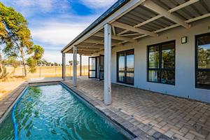 Stylish 3-Bedroom Home with Pool, Braai Patio & Stunning Views