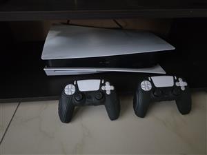 PS5 1TB with 2 controllers,disc and online version