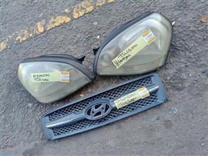 Hyundai tucson 2008 headlight / grill