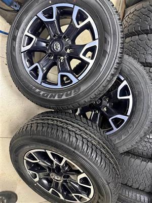 Toyota Legend 50 rims with 265/60 R18 Dunlop grandtrek