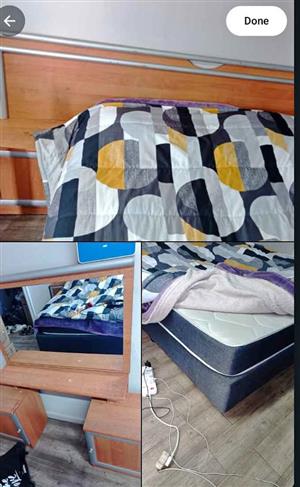 Bedroom setup : Double bed , headboard with storage and dresser