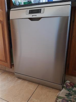 Silver Smeg dishwasher in very good condition for sale.