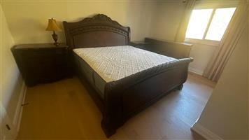 King-sized Bed With The Frame And Headboard 