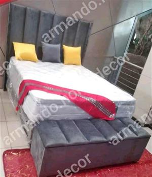 Grey velvet winged headboard and kist