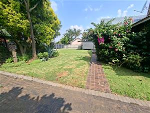 Spacious Family Home on a 1,115 m² Yard with Flatlet, Entertainment Area, Pergola & work station.