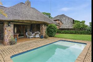 Charming Stone and thatch home