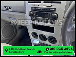 Stripping an Automatic Dodge Caliber At Jeep Bully's – Infotainment System Ready To Go