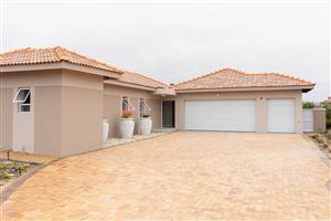 Luxury, Light, and Lifestyle with Greenbelt and Fairway Views