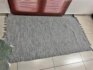Large grey woven rug